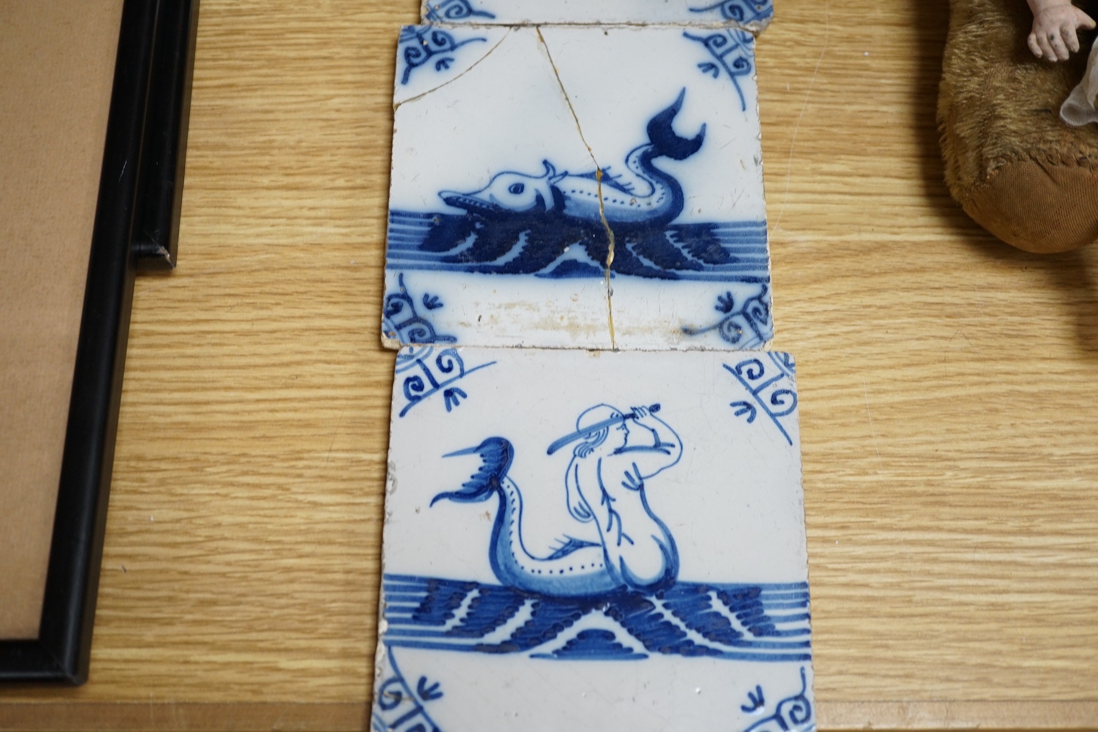 A group of six 18th/19th century blue and white Delft tiles, 13cms square